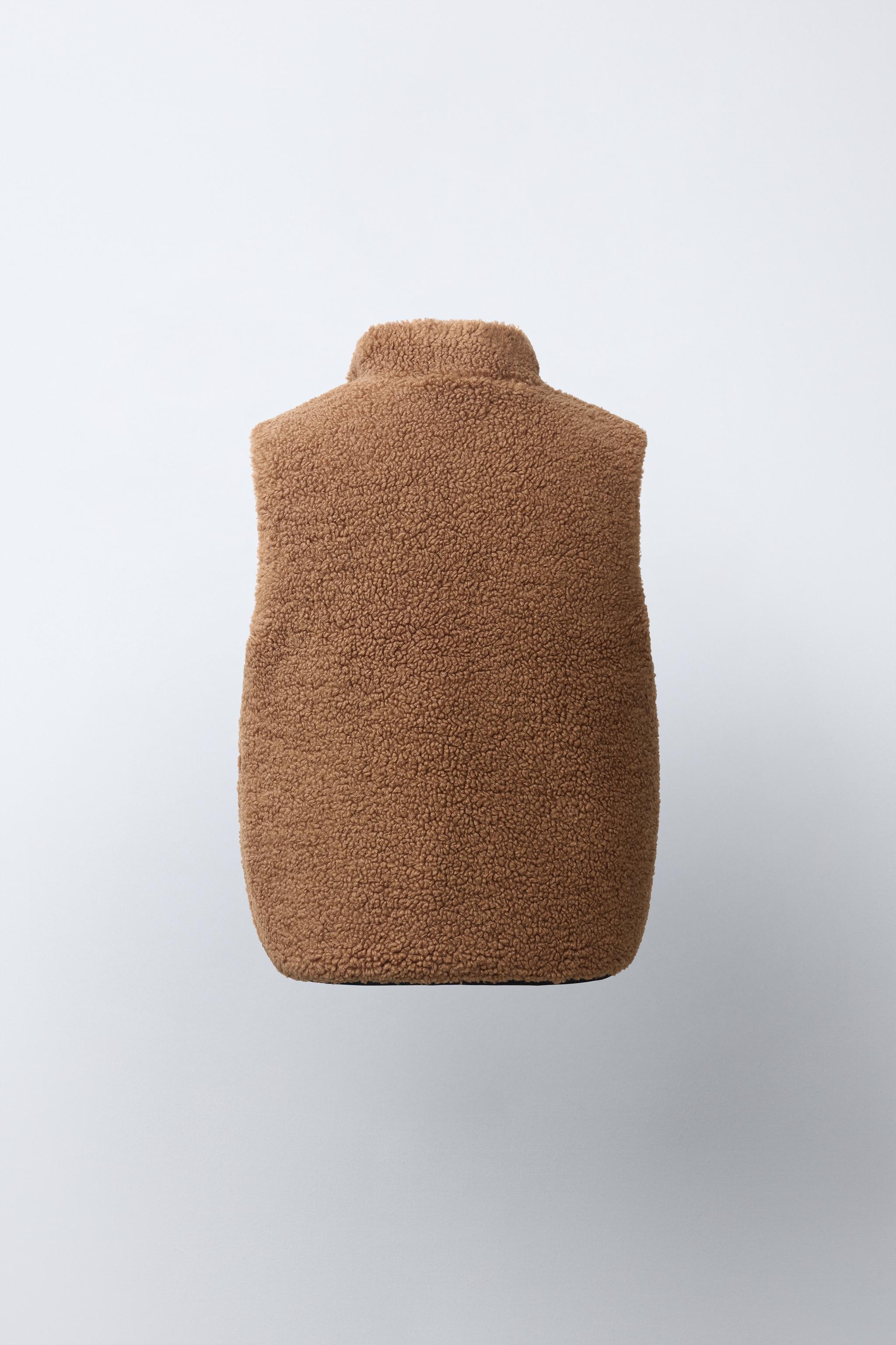 GILET SANS MANCHES RÉVERSIBLE EFFET MOUTON